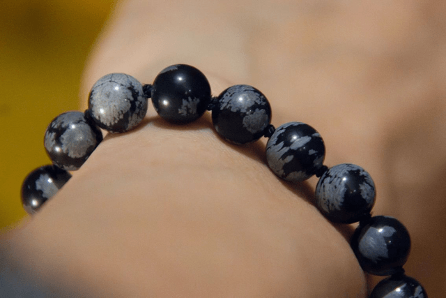 (M-L) Obsidienne flocon de neige / Bracelet coulissant inox et fil de soie